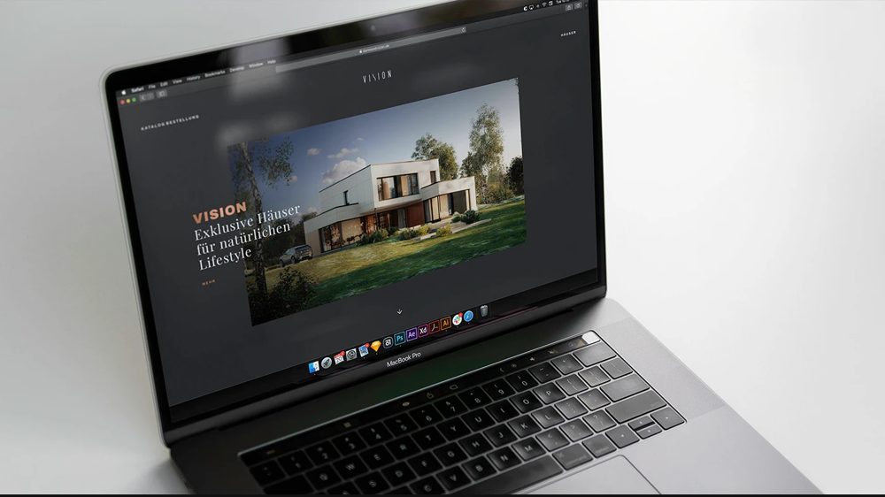 Strona VISION by Danwood na laptopie
